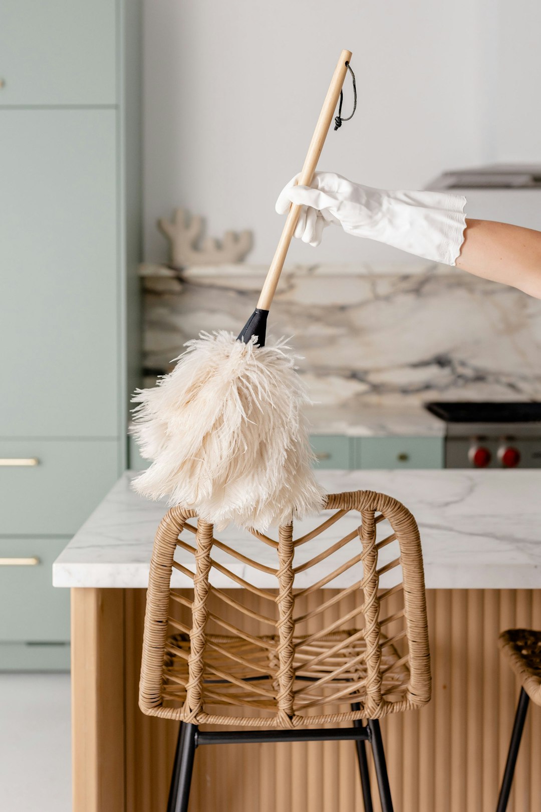digital a-person-in-white-gloves-is-cleaning-a-chair-wnudjlnuohu